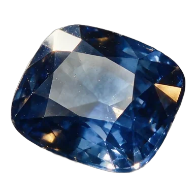 A loose faceted Ceylon blue sapphire on the bench.
